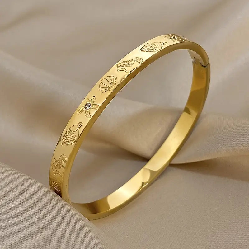 Ocean Oval Clip Bangle Gold